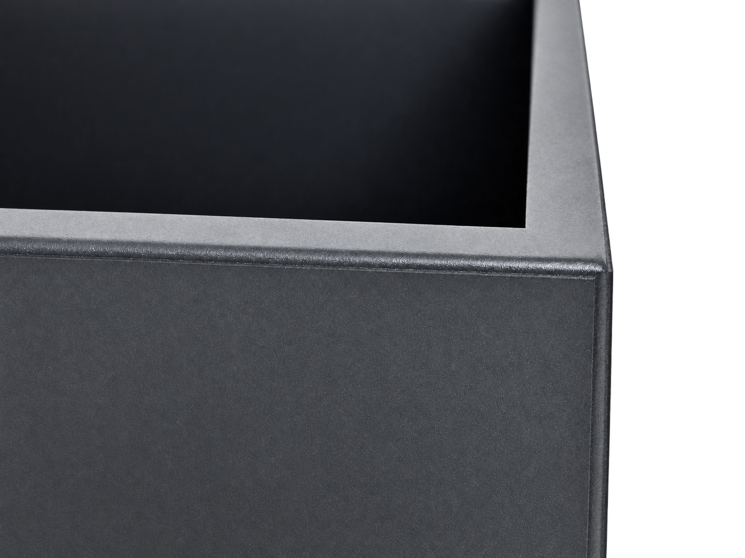 Close view of the Siena Kubo folded rim and charcoal metal surface